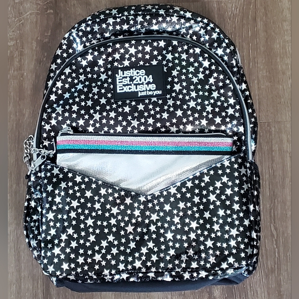 Justice backpack NWT.  Black with stars.  Comes with detachable zippered pouch.
